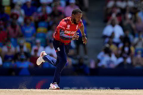 Chris Jordan celebrates after getting a hat-trick against USA